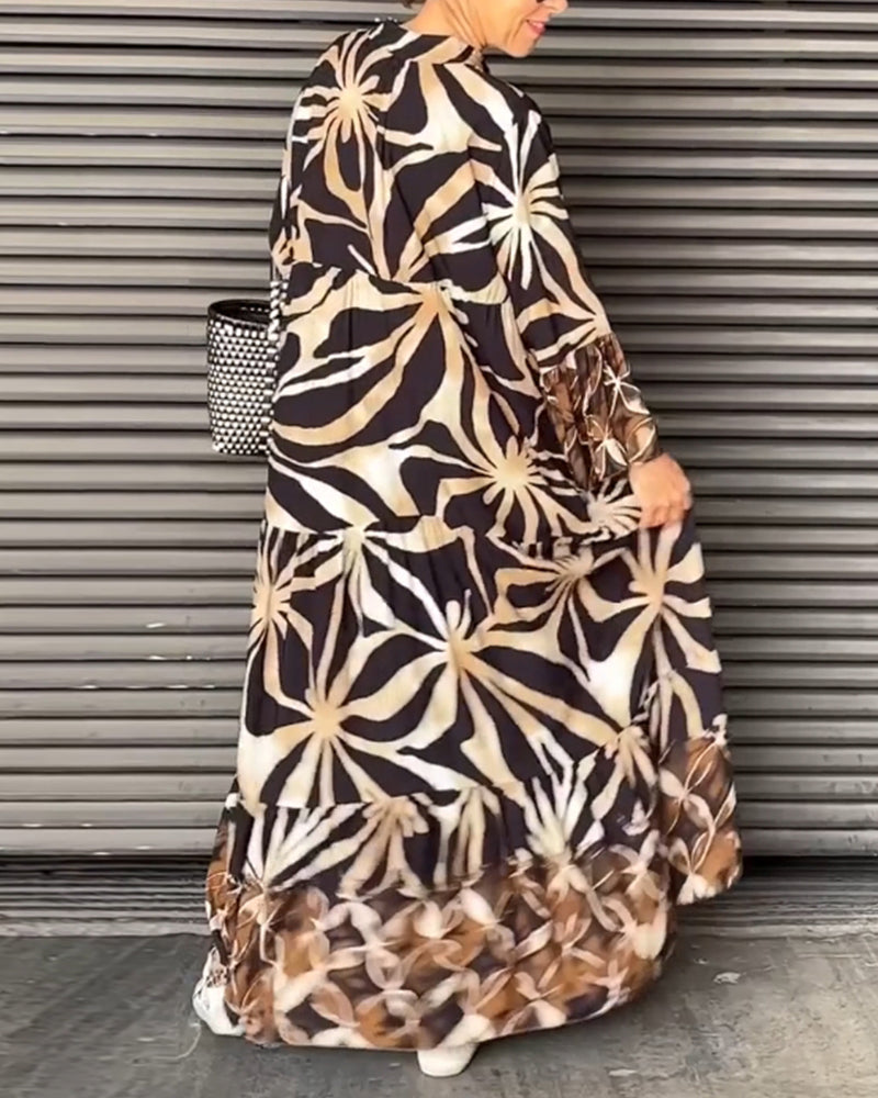 Casual, flowy vacation dress with a colorful print.