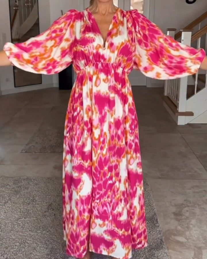 V-neck dress with a trendy print and 3/4 sleeves