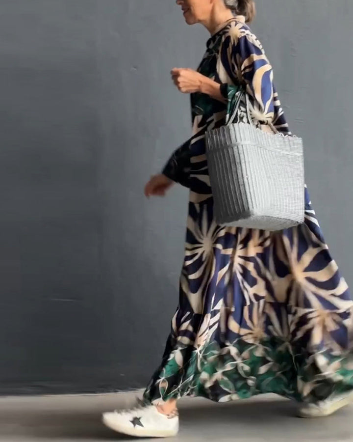 Casual, flowy vacation dress with a colorful print.