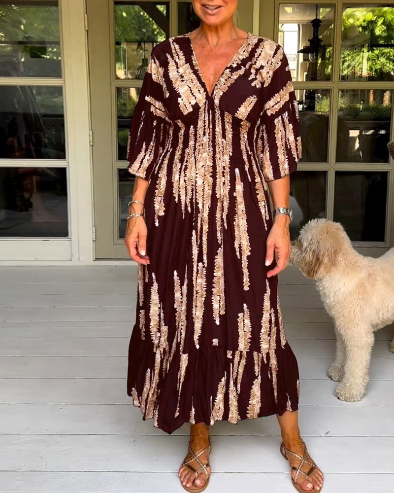 Elegant dress with 3/4 sleeves and a V-neck