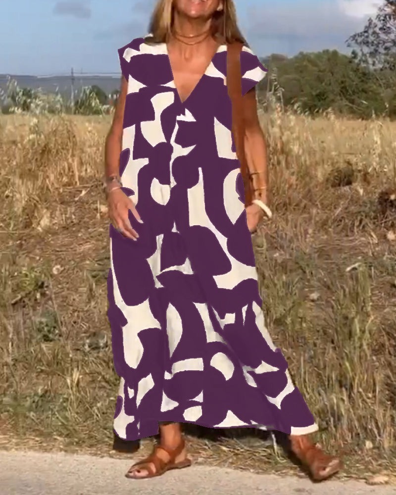 Stylish dress with a trendy print and V-neck