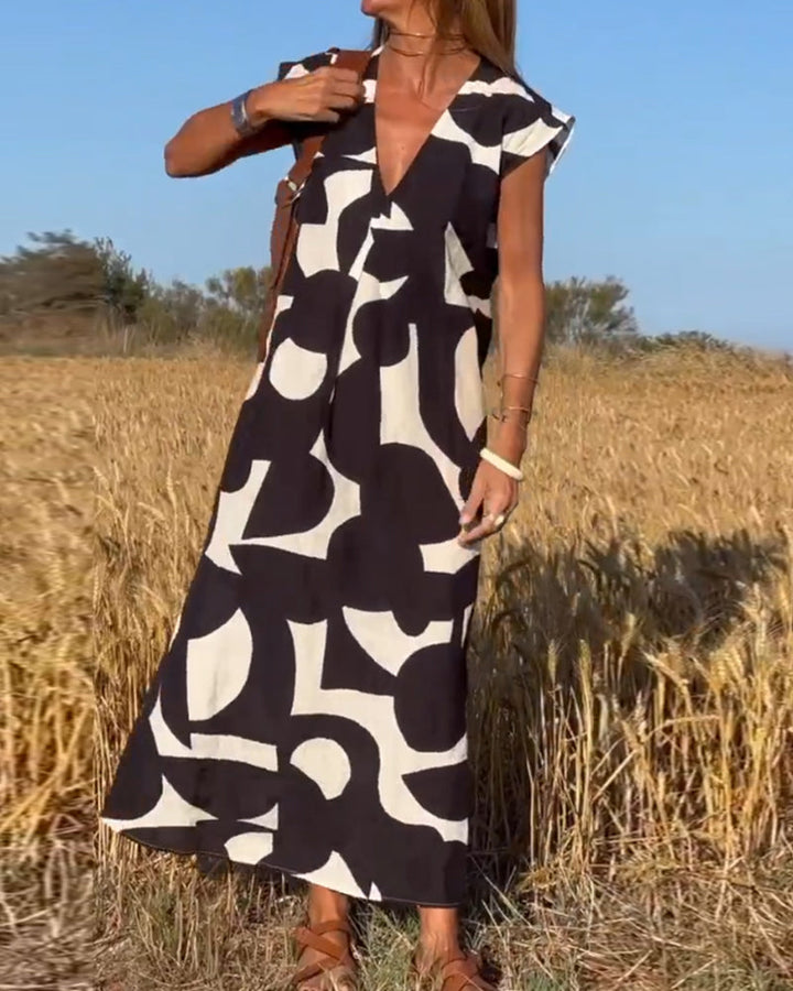 Stylish dress with a trendy print and V-neck