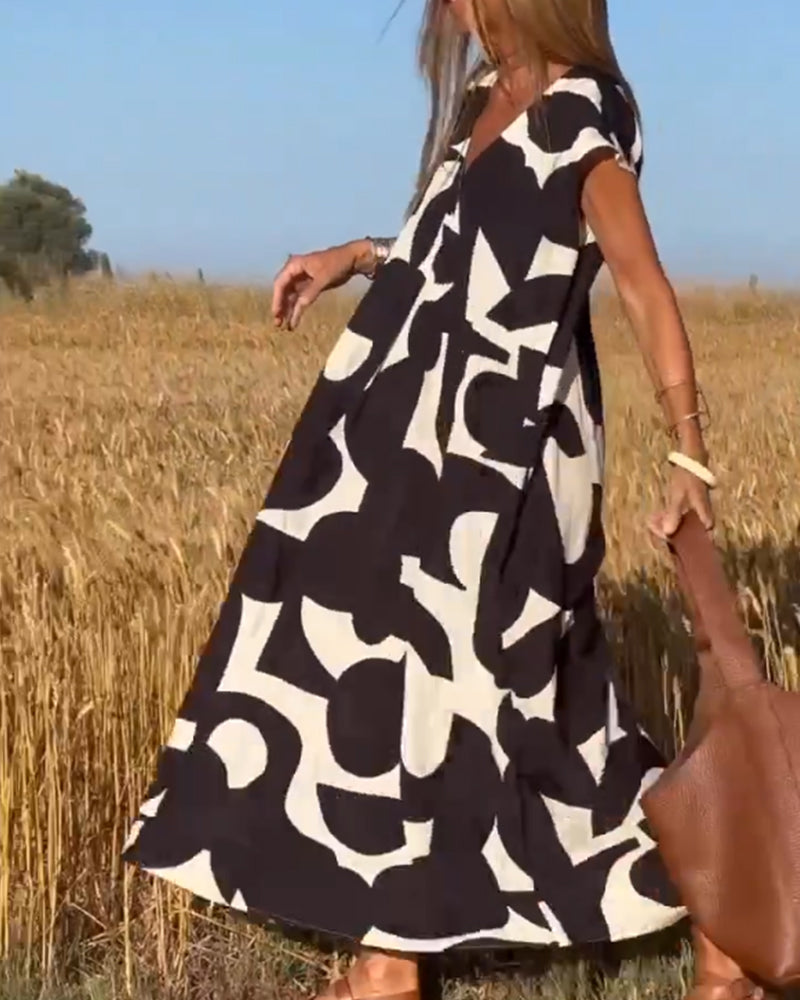 Stylish dress with a trendy print and V-neck