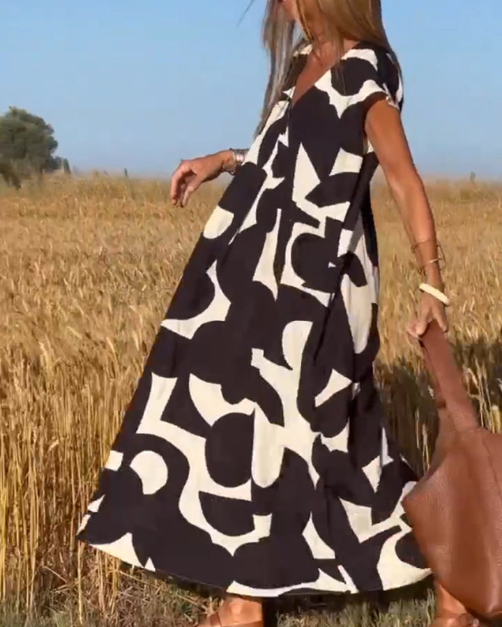 Stylish dress with a trendy print and V-neck