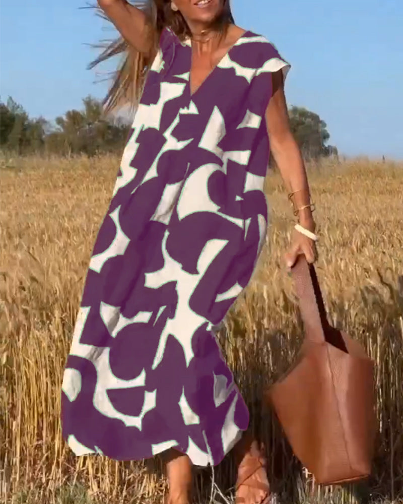 Stylish dress with a trendy print and V-neck