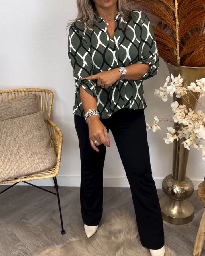 Casual long-sleeve blouse with a trendy print