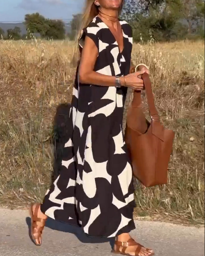 Stylish dress with a trendy print and V-neck