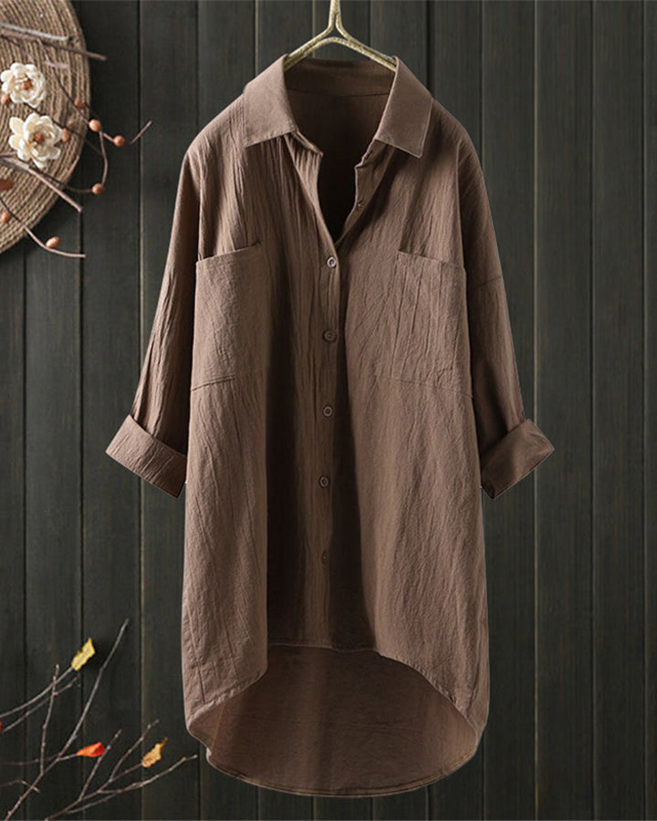 Casual, solid-colored blouse with long sleeves — a versatile everyday basic