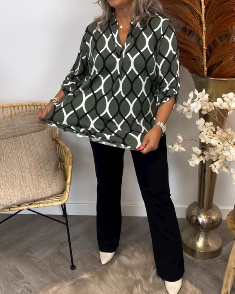 Casual long-sleeve blouse with a trendy print